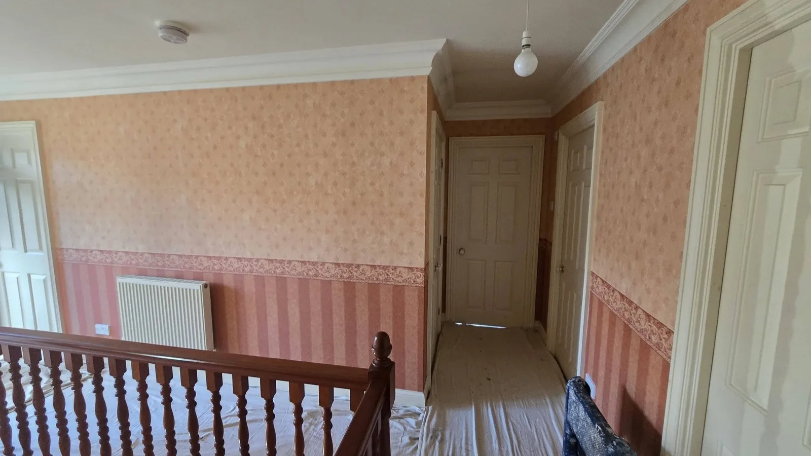 Landing before: dated pink floral wallpaper